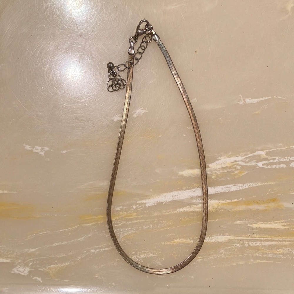 Gold herringbone necklace